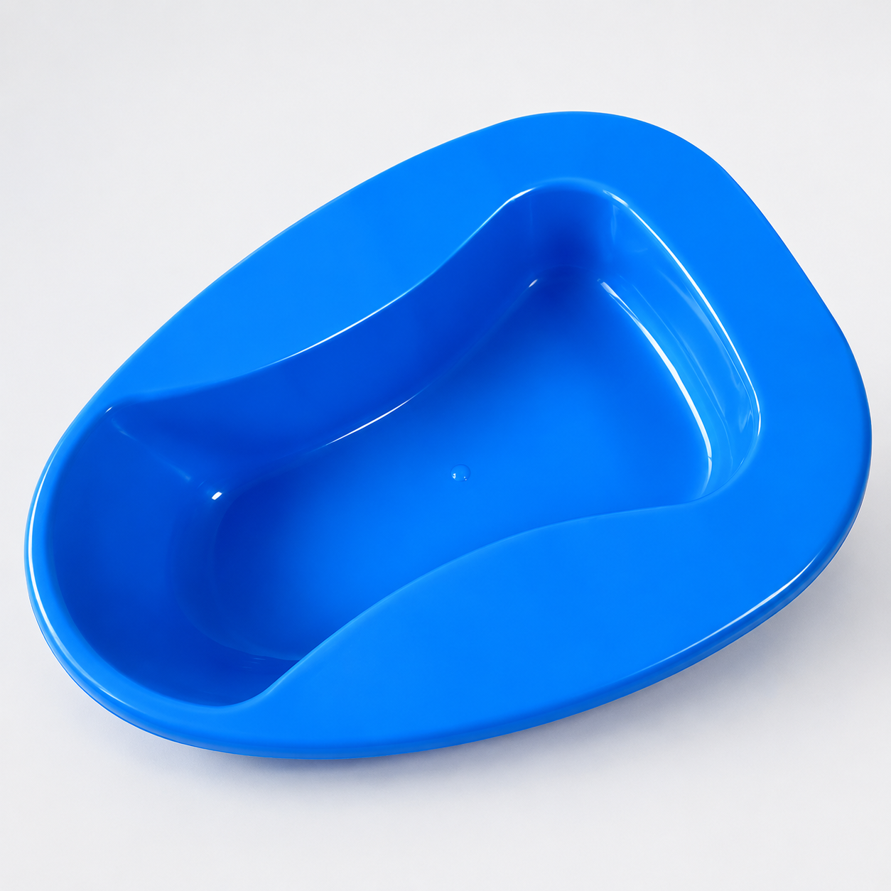 Durable plastic bed pan for hospital and home patient care in Kenya